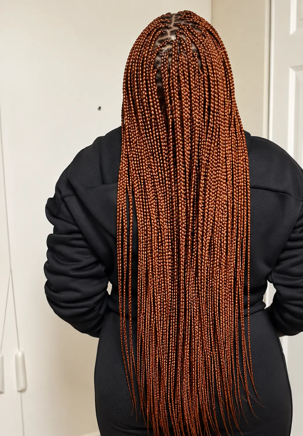 Extra-long copper box braids, back view