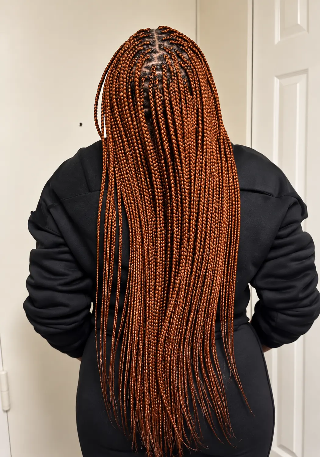 Copper box braids with neat square parts, back view