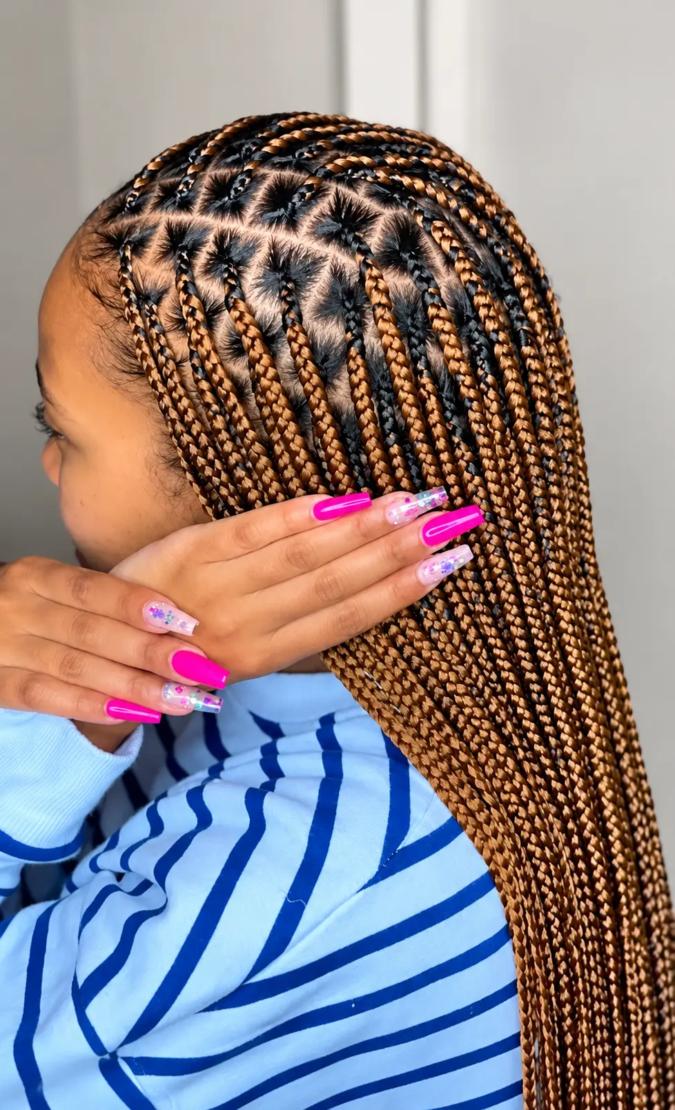 Small caramel knotless braids with neat parts